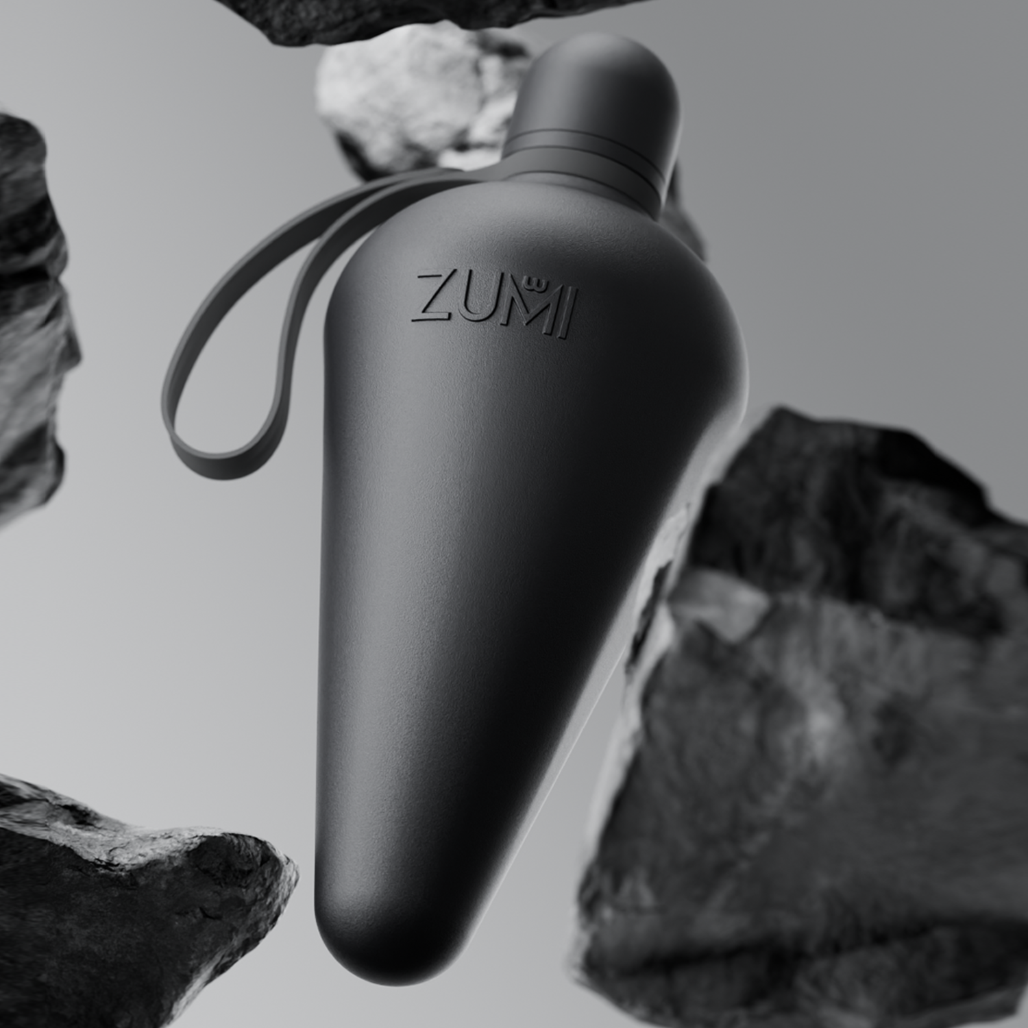 A black stainless steel reusable water bottle with a loop on the lid, branded with 'ZUMI'.