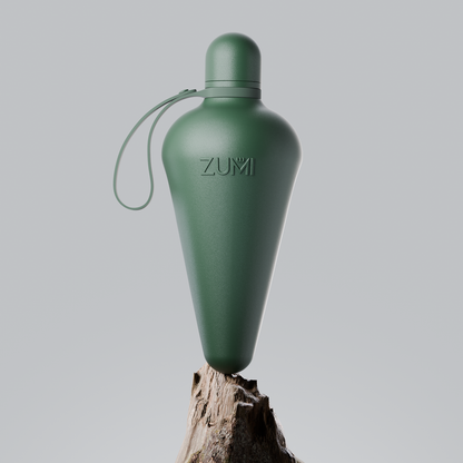 A Green stainless steel reusable water bottle with a loop on the lid, branded with 'ZUMI'.