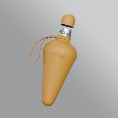 A beige stainless steel reusable water bottle with a loop on the lid, branded with 'ZUMI'.